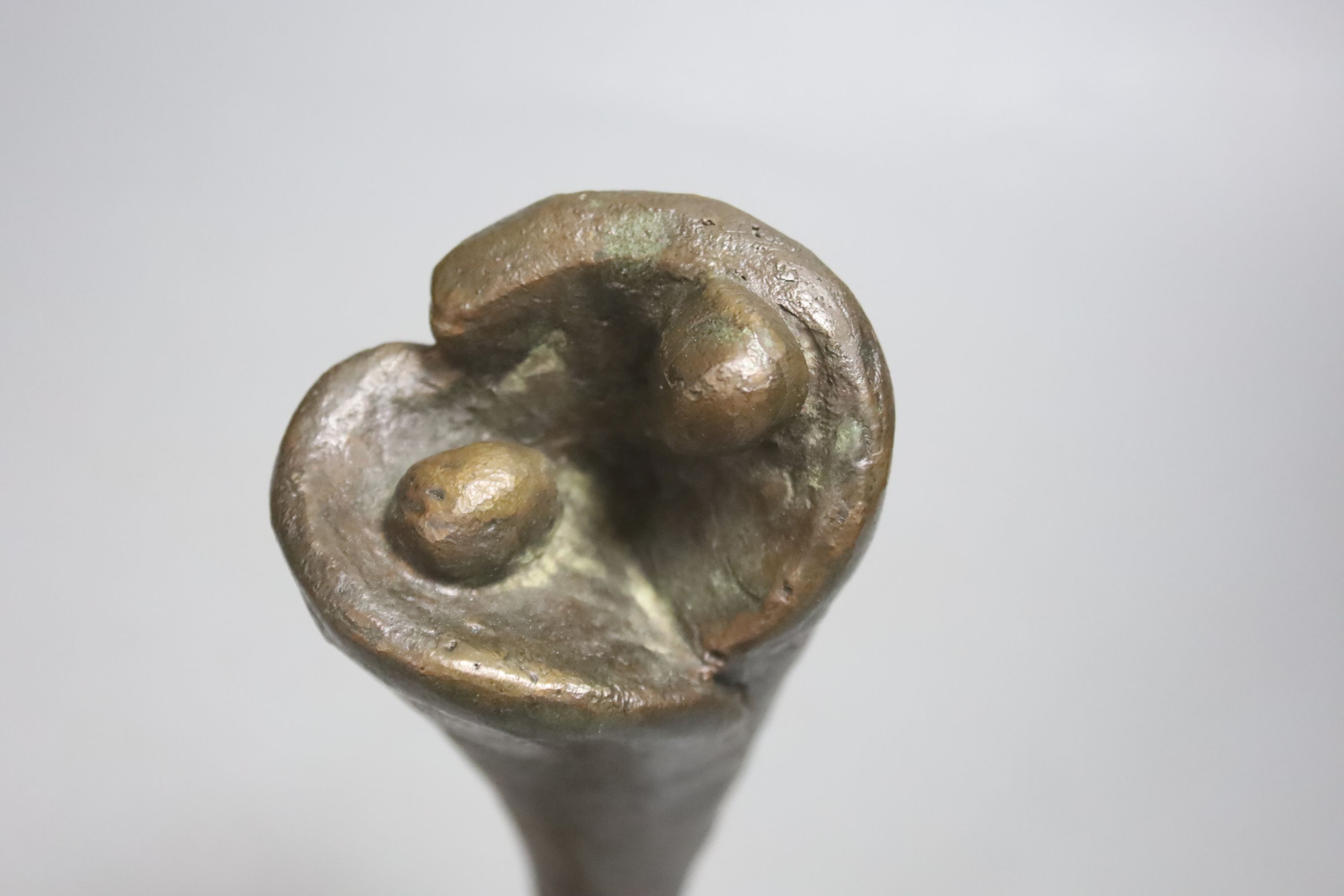 A Henry Moore style abstract figural bronze, indistinctly signed and dated, height 23cm